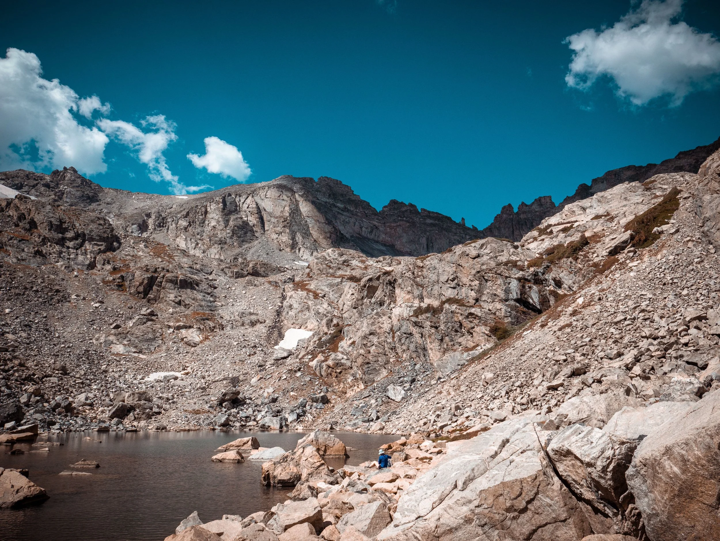 Colorado wilderness scene evoking stillness and depth, qualities central to somatic and trauma-informed therapy