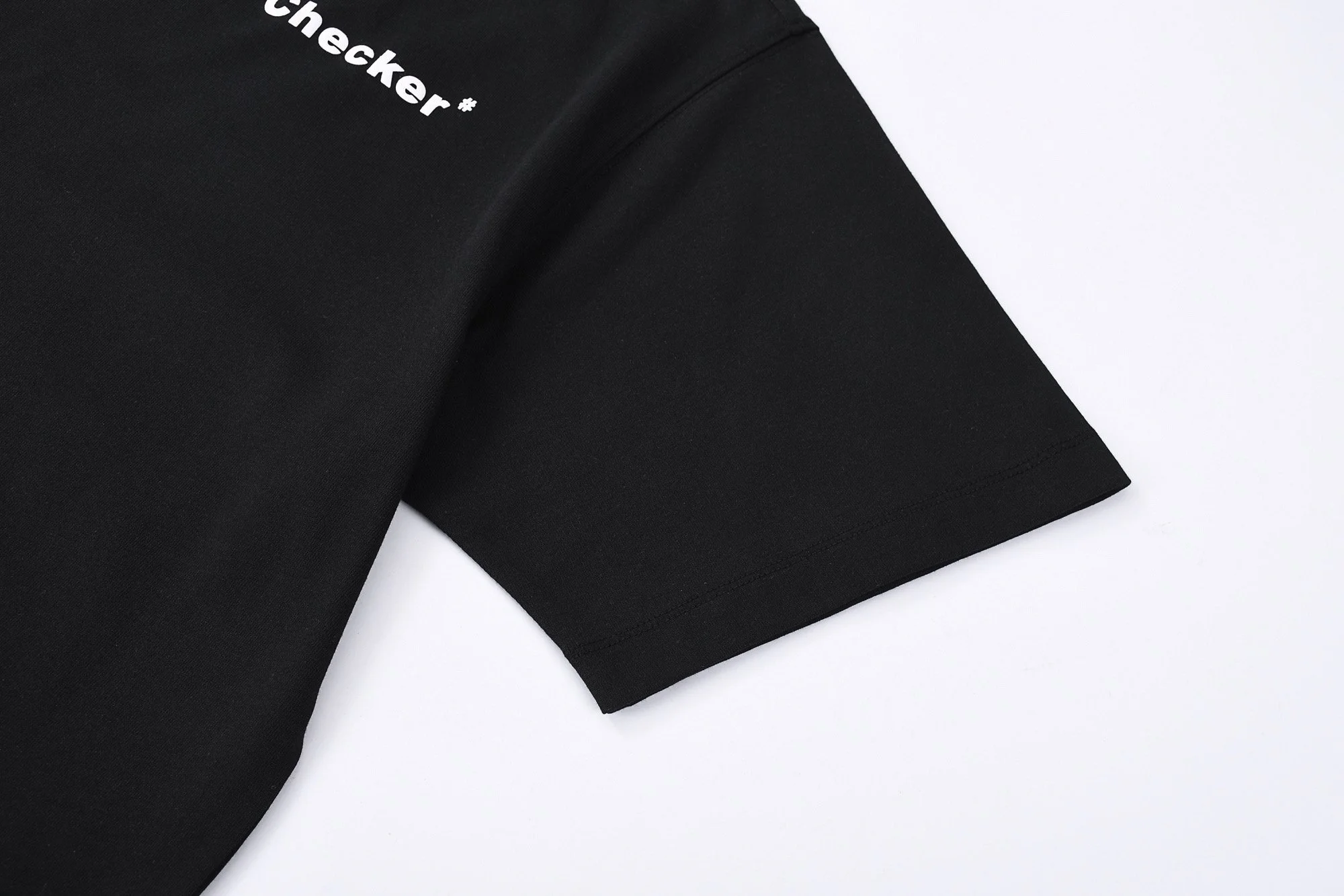 Close-up of a quality black T-shirt.