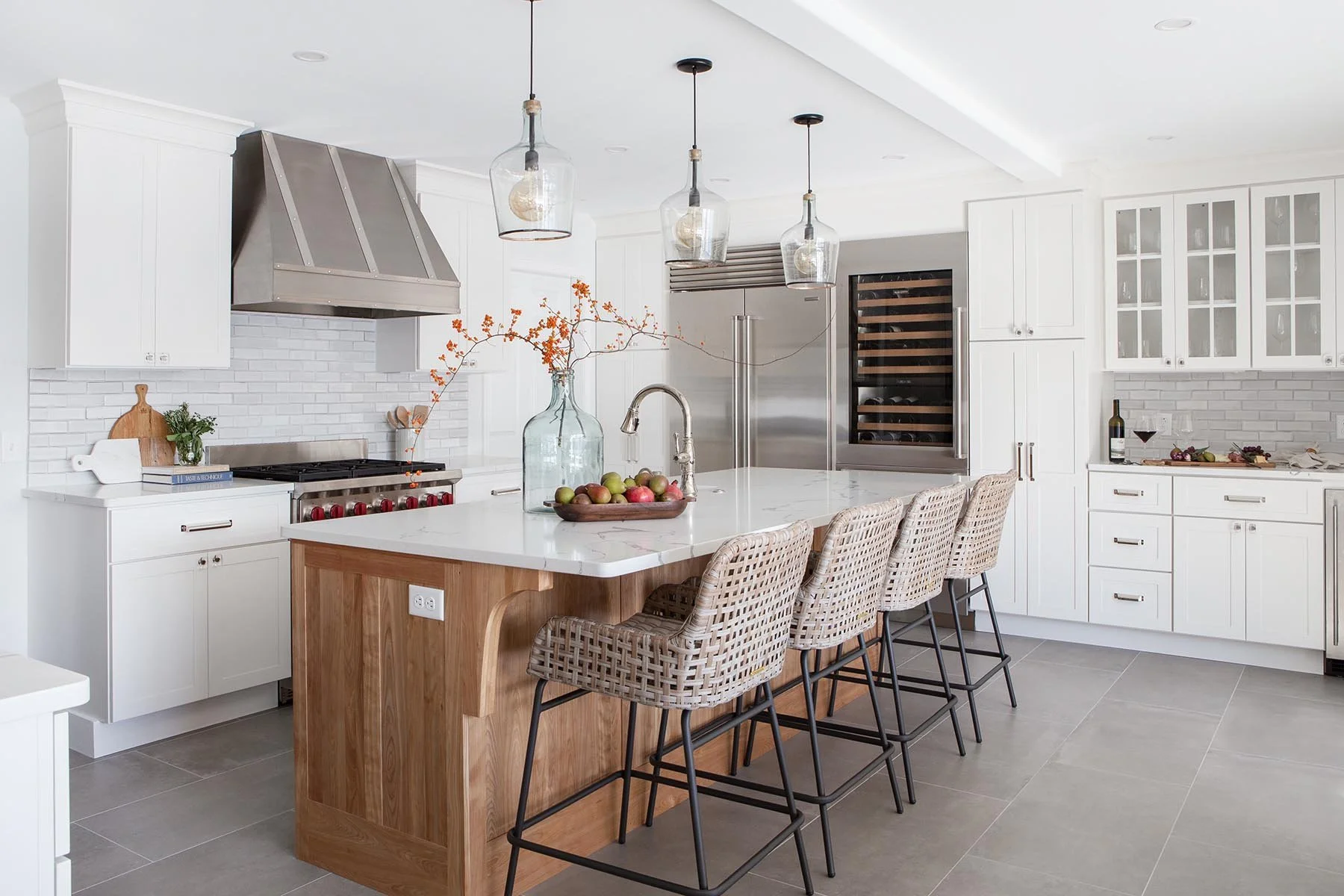 Lakehouse kitchen featuring inset shaker cabinetry, Wolfe/Subzero appliances