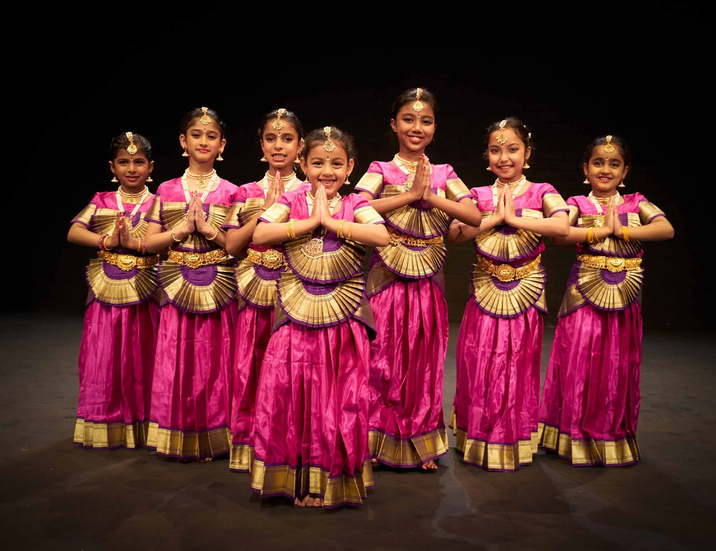 satyam-dance-students-bharatanatyam-line-namaste-stage.jpg