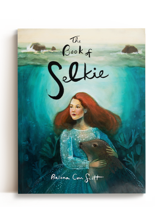 Book cover titled "The Book of Selkie" showing a woman with long red hair holding a seal, underwater and shoreline in the background.