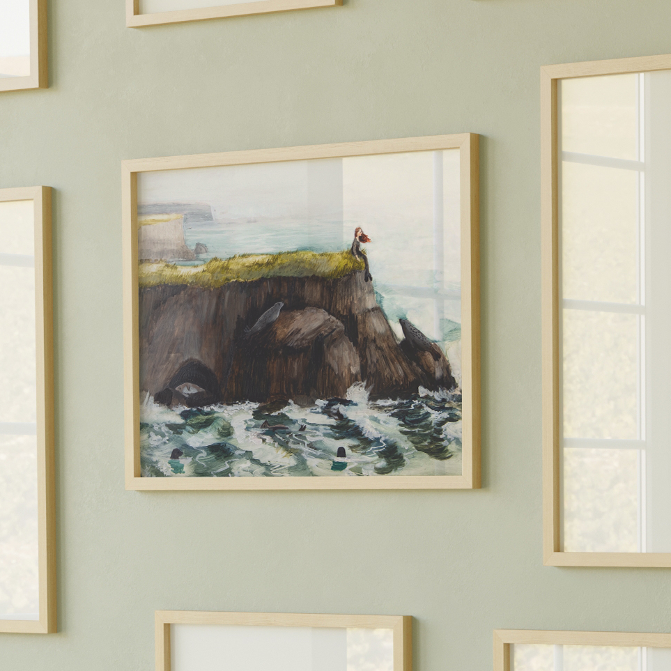 Painting of a red-haired woman sitting on a grassy cliff above crashing waves, surrounded by seals – selkie folklore art by Briana Corr Scott