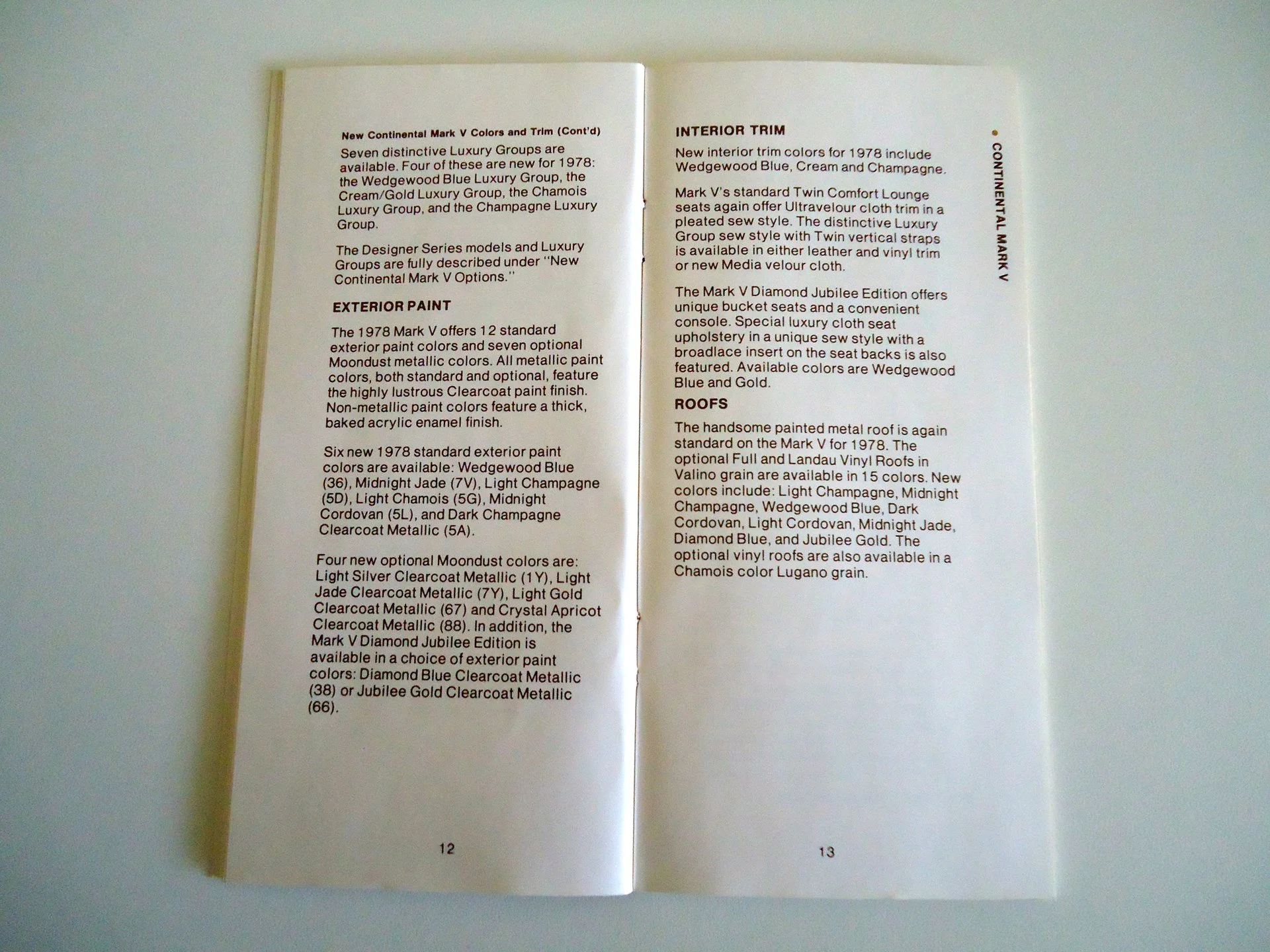 Open car manual showing pages about exterior paint, interior trim, and roofs for 1978 Mark V vehicle.