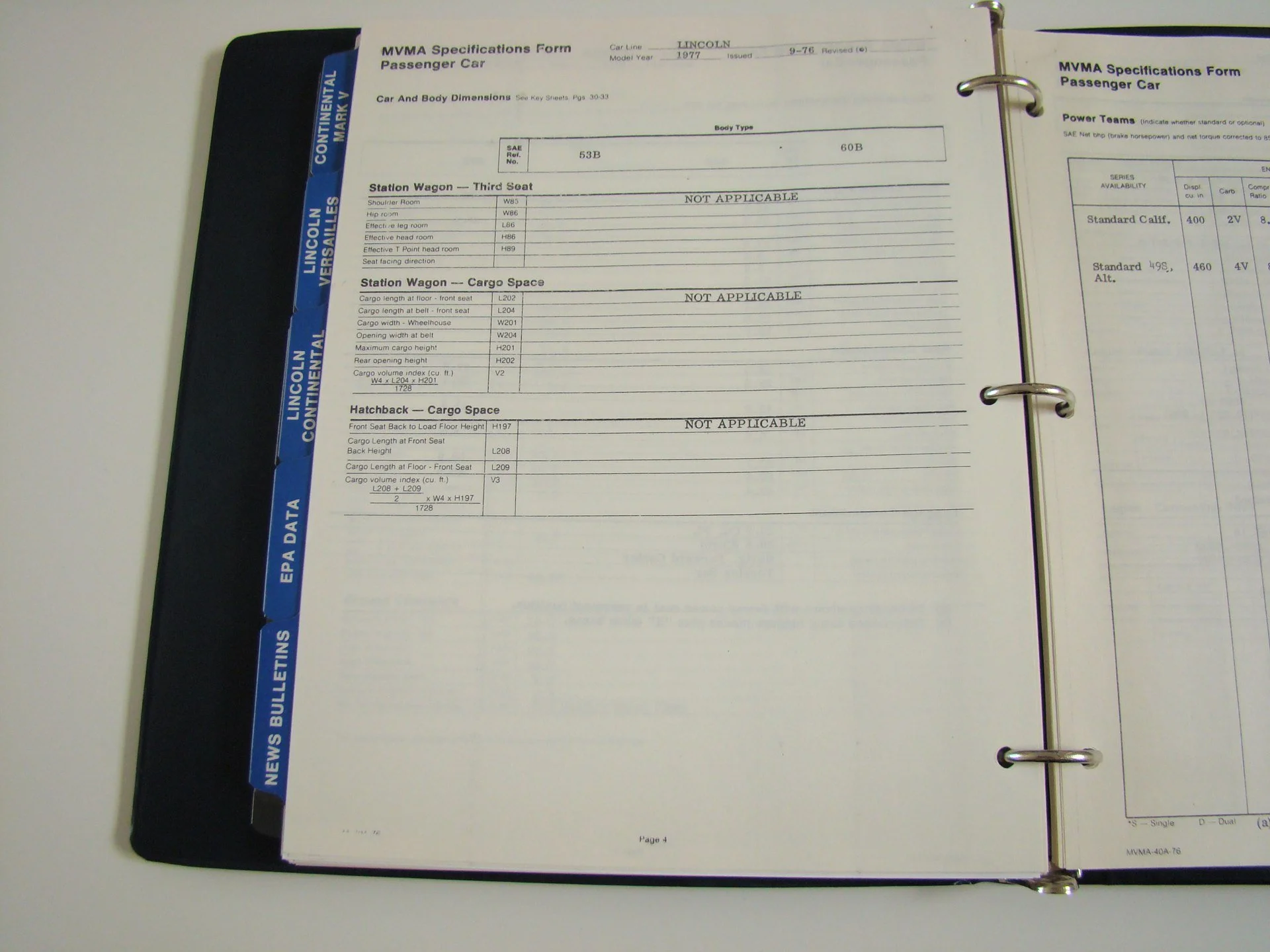Document titled 'MVMA Specifications Form Passenger Car' with sections for car dimensions, payload, and cargo space details, secured in a binder.
