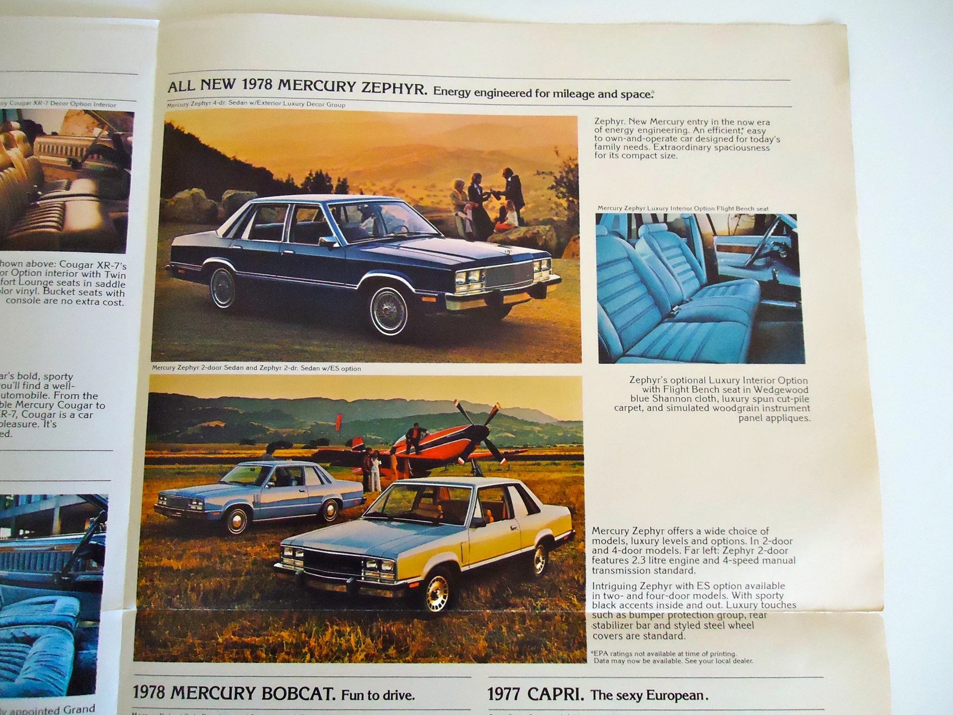 Page from a car brochure featuring the 1978 Mercury Zephyr, with images of the car on a scenic landscape, showing the exterior and interior, including a blue interior with leather seats and woodgrain accents.