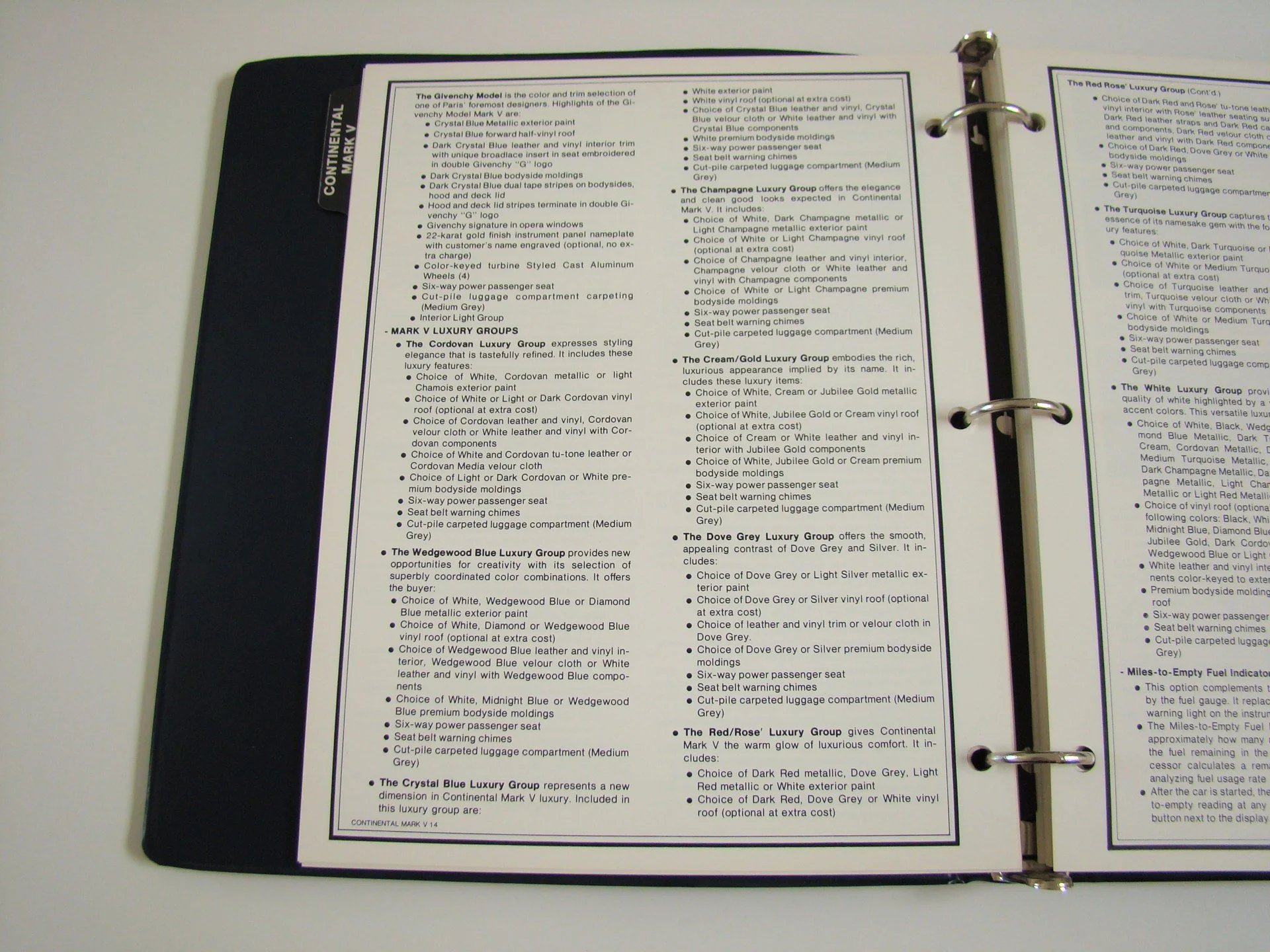 A printed brochure or catalog page displaying detailed descriptions of various luxury car model options and packages, including exterior and interior features, color choices, and optional upgrades.