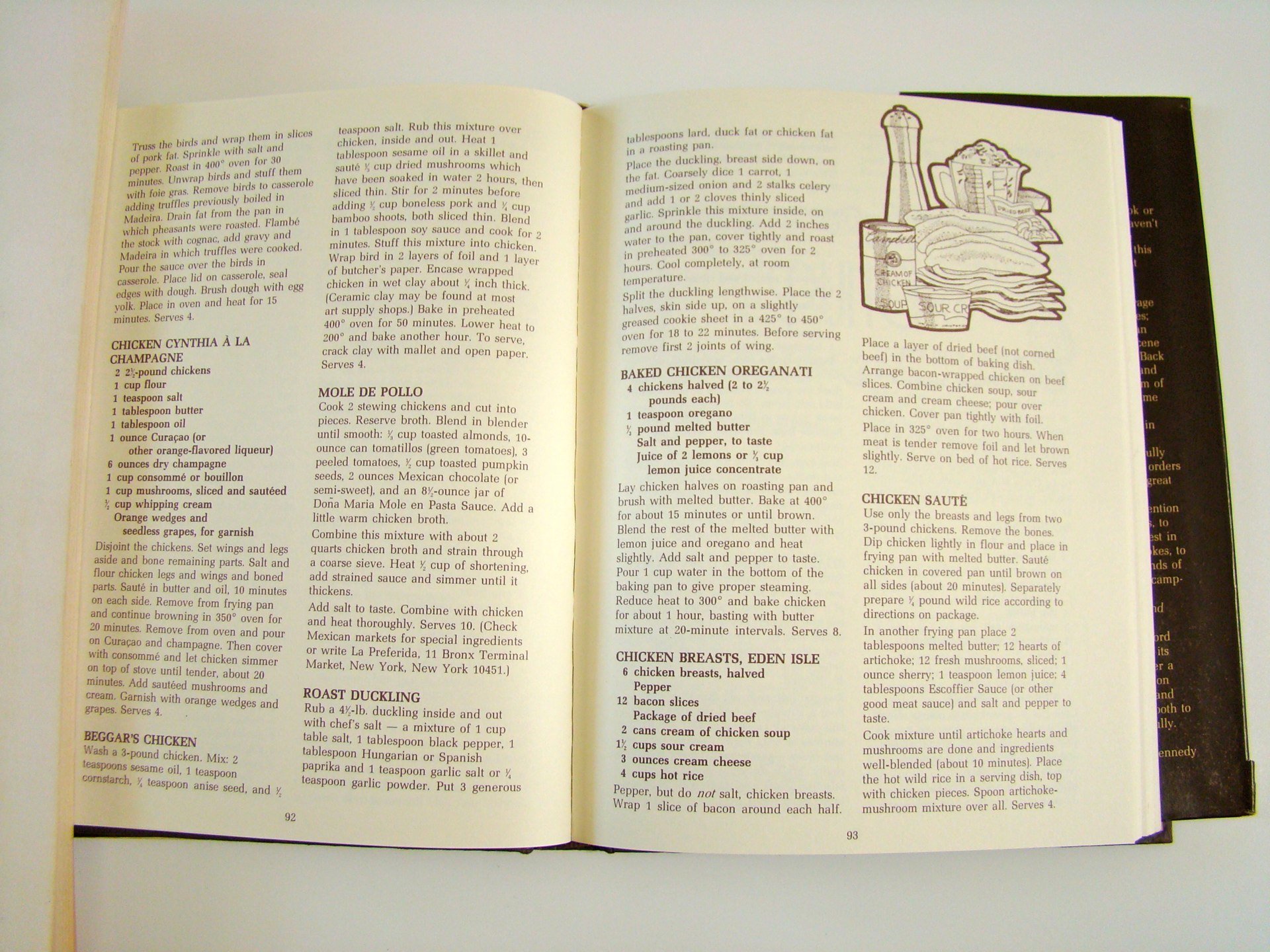 Open cookbook with recipes and a sketch of a cup, glass, and some food.