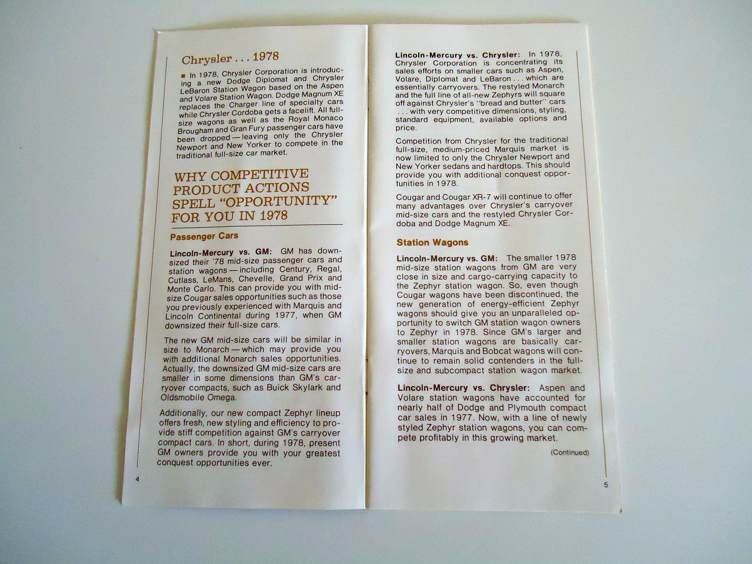 An open vintage brochure or booklet about Chrysler and Lincoln-Mercury cars from 1978, with information on models, competition, and market strategies.