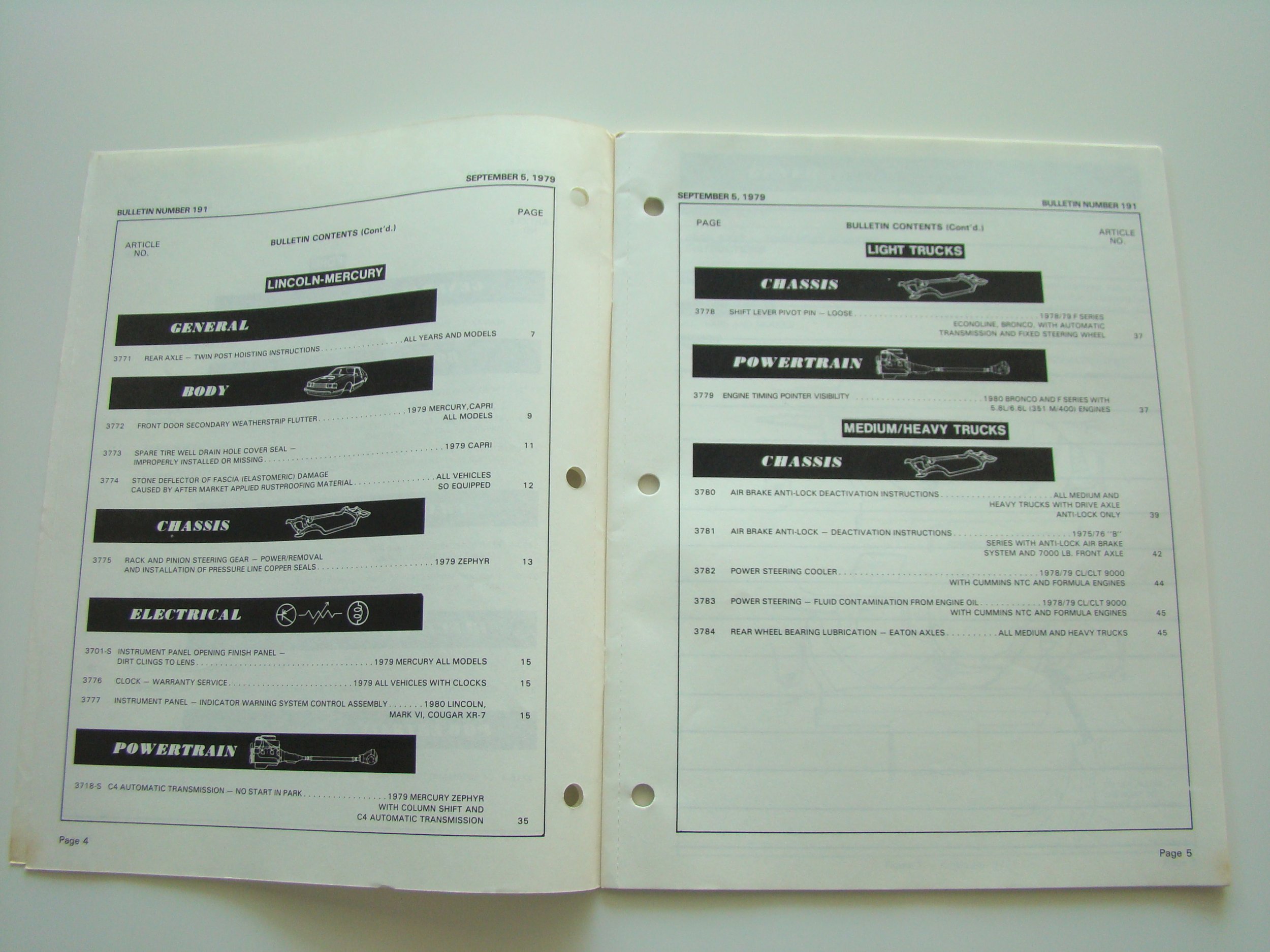 Open vehicle parts catalog showing sections on Lincoln-Mercury cars, including general, body, chassis, electrical, and powertrain, dated September 5, 1979.