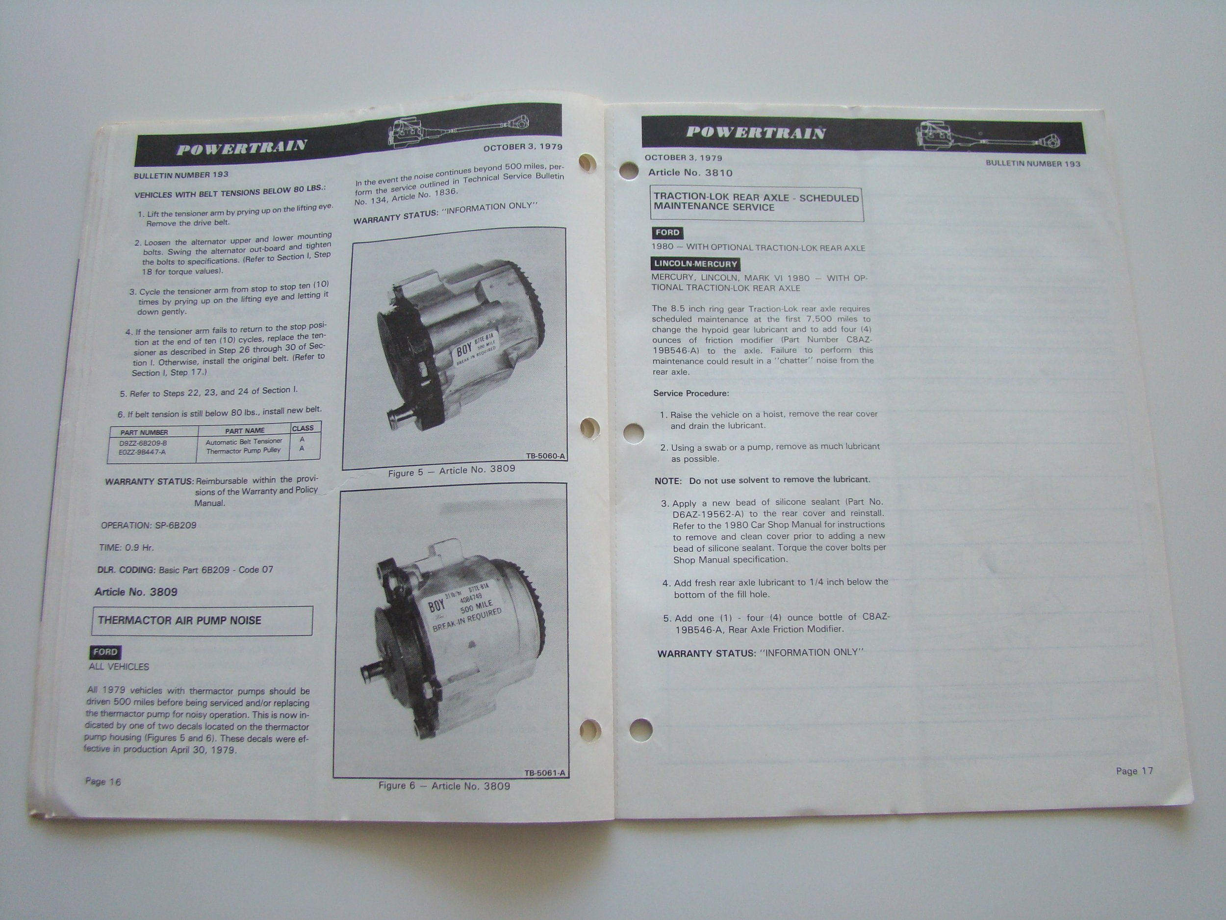 Open manual with pages showing maintenance instructions for vehicle rear axle, including product images of a rear axle and air pump, from October 3, 1979.