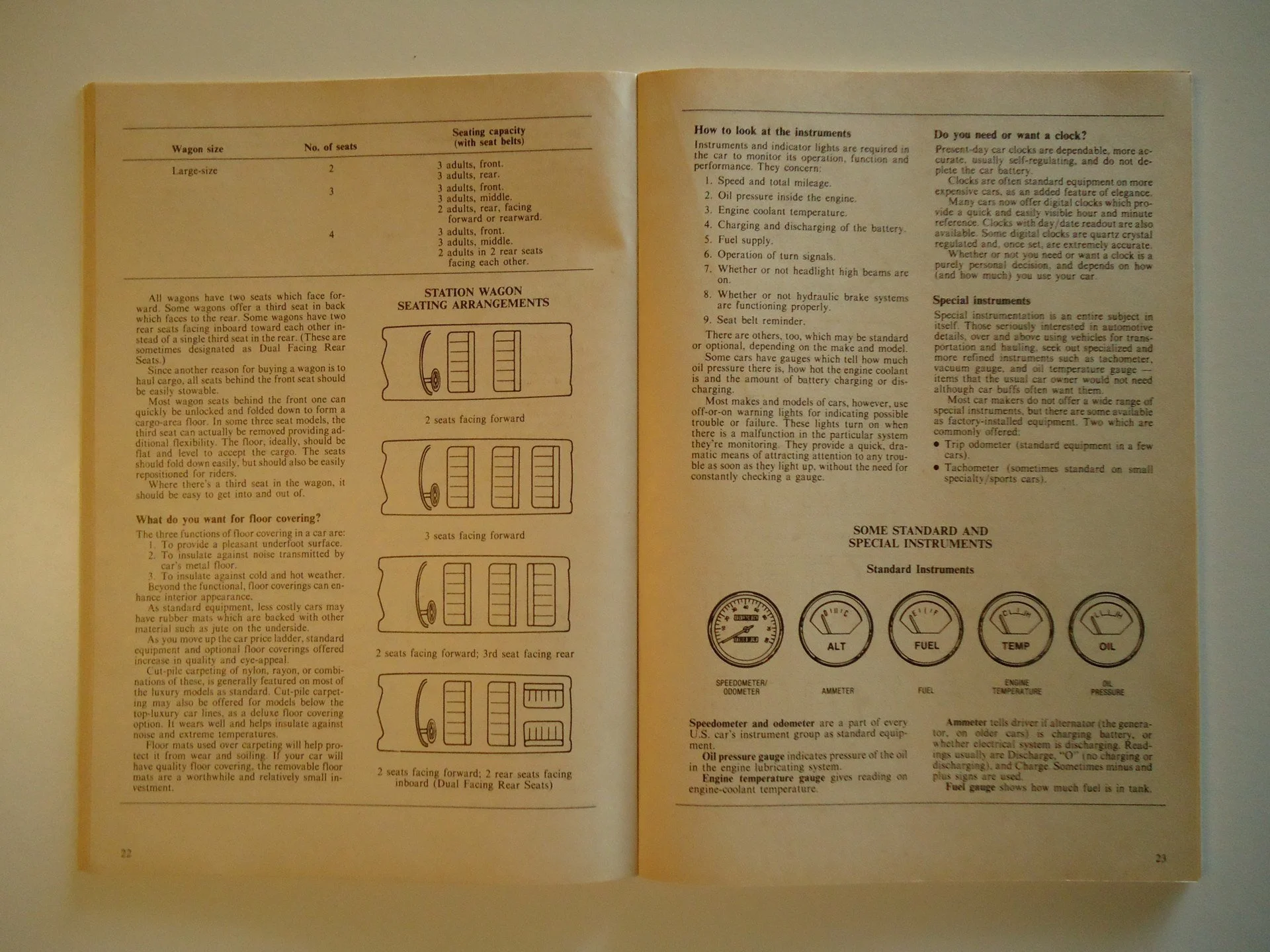 Open manual or booklet with text about wagon seating arrangements and instrument gauges.