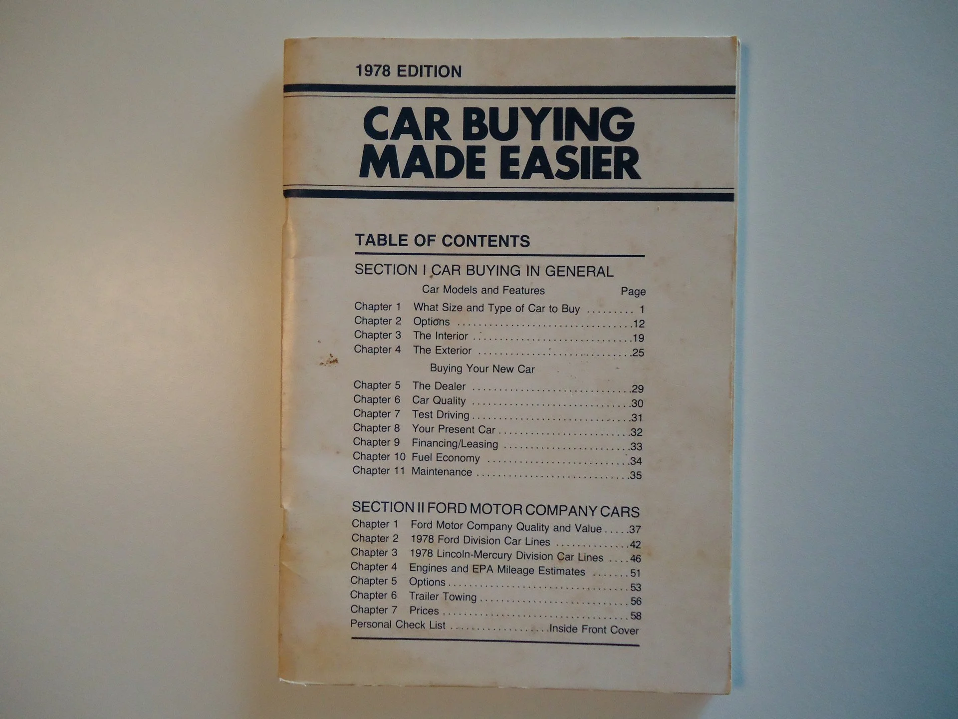 Page from a 1978 edition car buying guide, including table of contents covering topics like car models, interior, exterior, dealer, quality, test driving, financing, and Ford and Lincoln-Mercury cars.