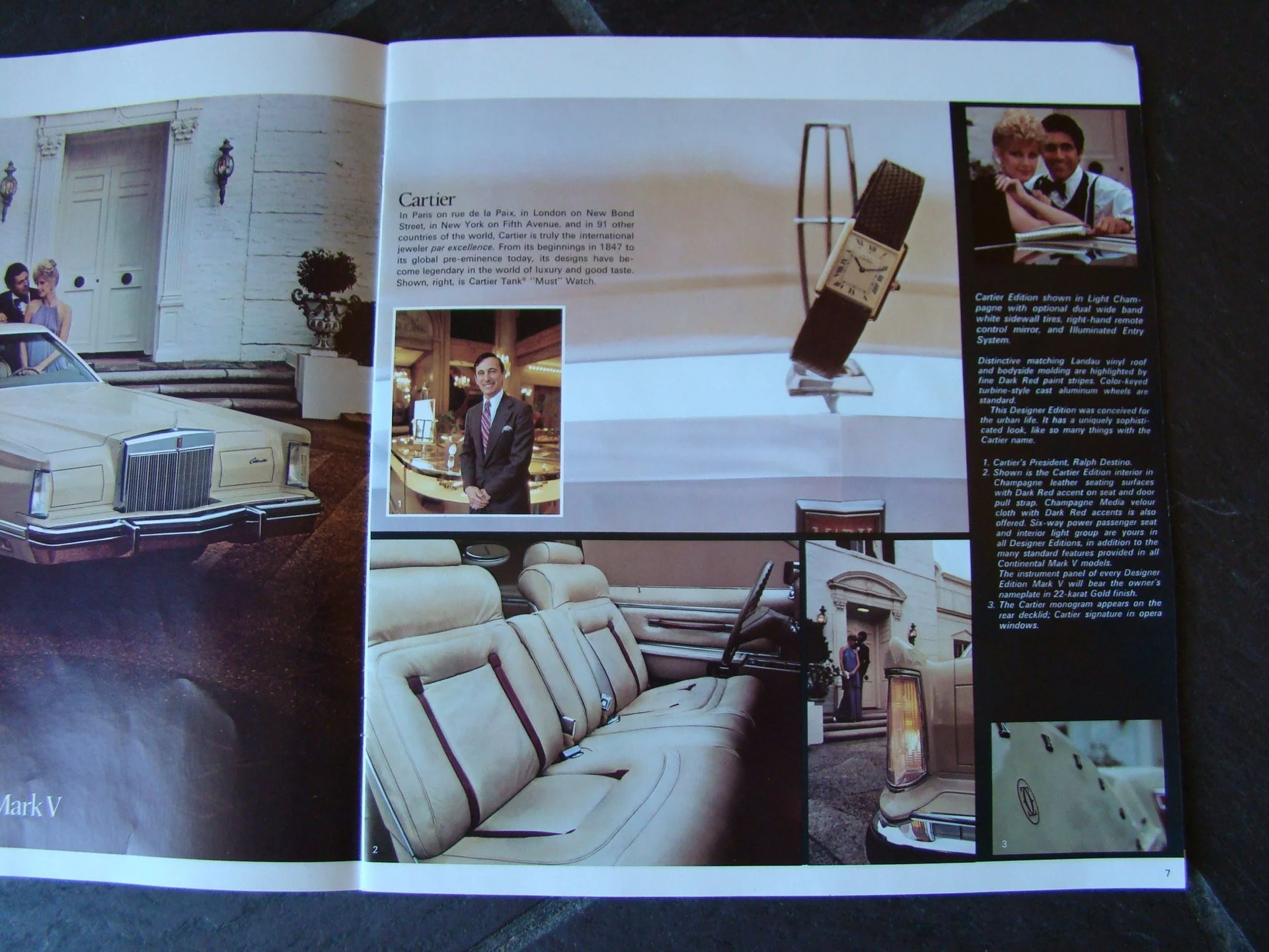 Open magazine with images of a beige classic car, a man in a suit, a woman and a child at a table, a luxury interior, and a close-up of a car grille. Text describes Cartier watches and branding details.