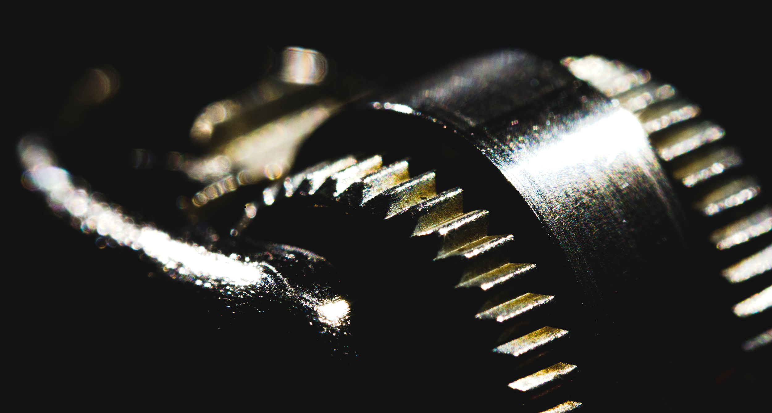 Close-up of a disposable lighter with a metal top and ignition wheel.