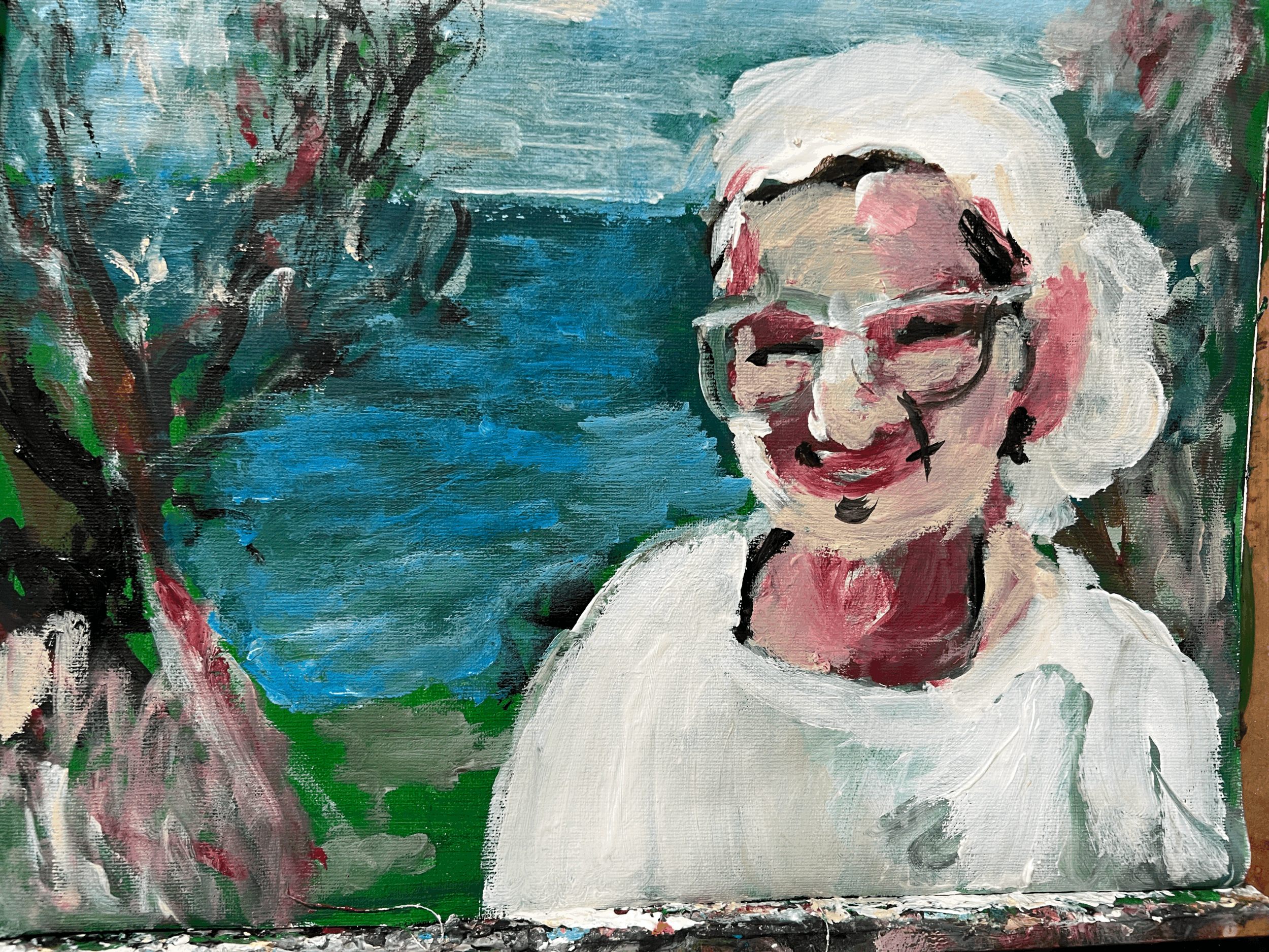 An oil painting of an elderly woman with white hair, glasses, and earrings, smiling in front of a background featuring trees and a body of water.