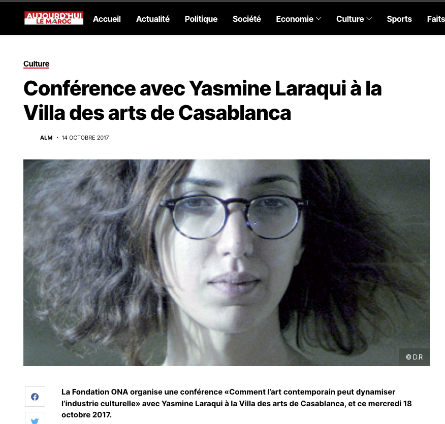 A woman with glasses and wavy hair looking directly at the camera. yasmine laraqui conference at la villa des arts casablanca