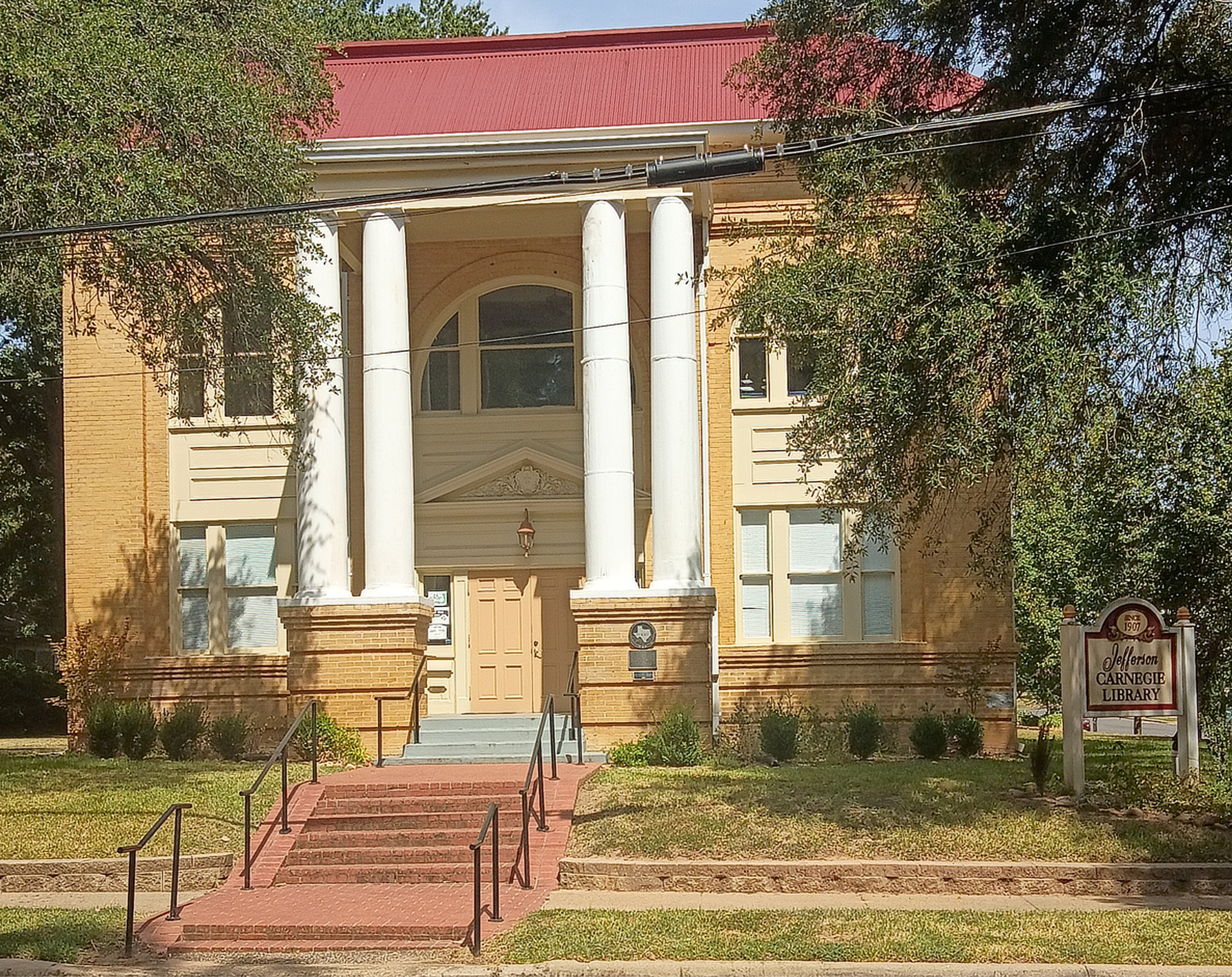 Front exterior of the historic Jefferson Carnegie Library in Jefferson, Texas, photographed in 2026.