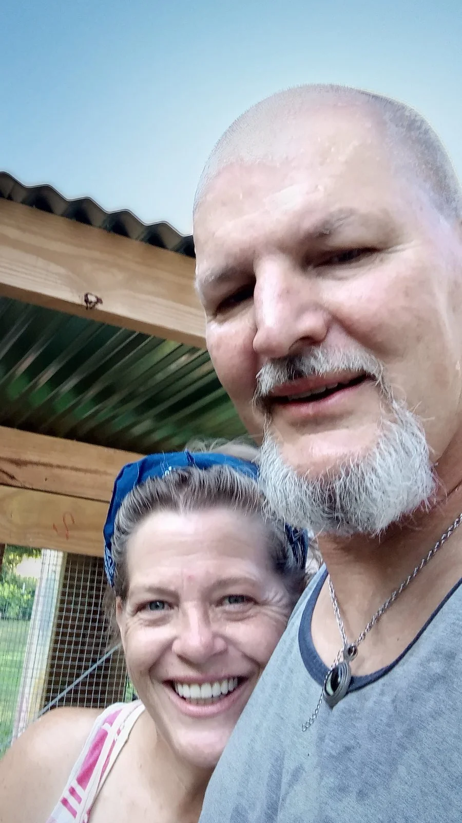 Gene built these raised rabbit hutches so Jacqui wouldn’t have to bend with all the metal in her spine. This photo shows them together at T Bones Place, their un-modern East Texas farmstead.