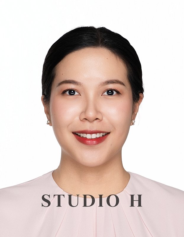 A smiling woman with dark hair, wearing pearl earrings and a light-colored top, with the text 'STUDIO H' at the bottom of the image.