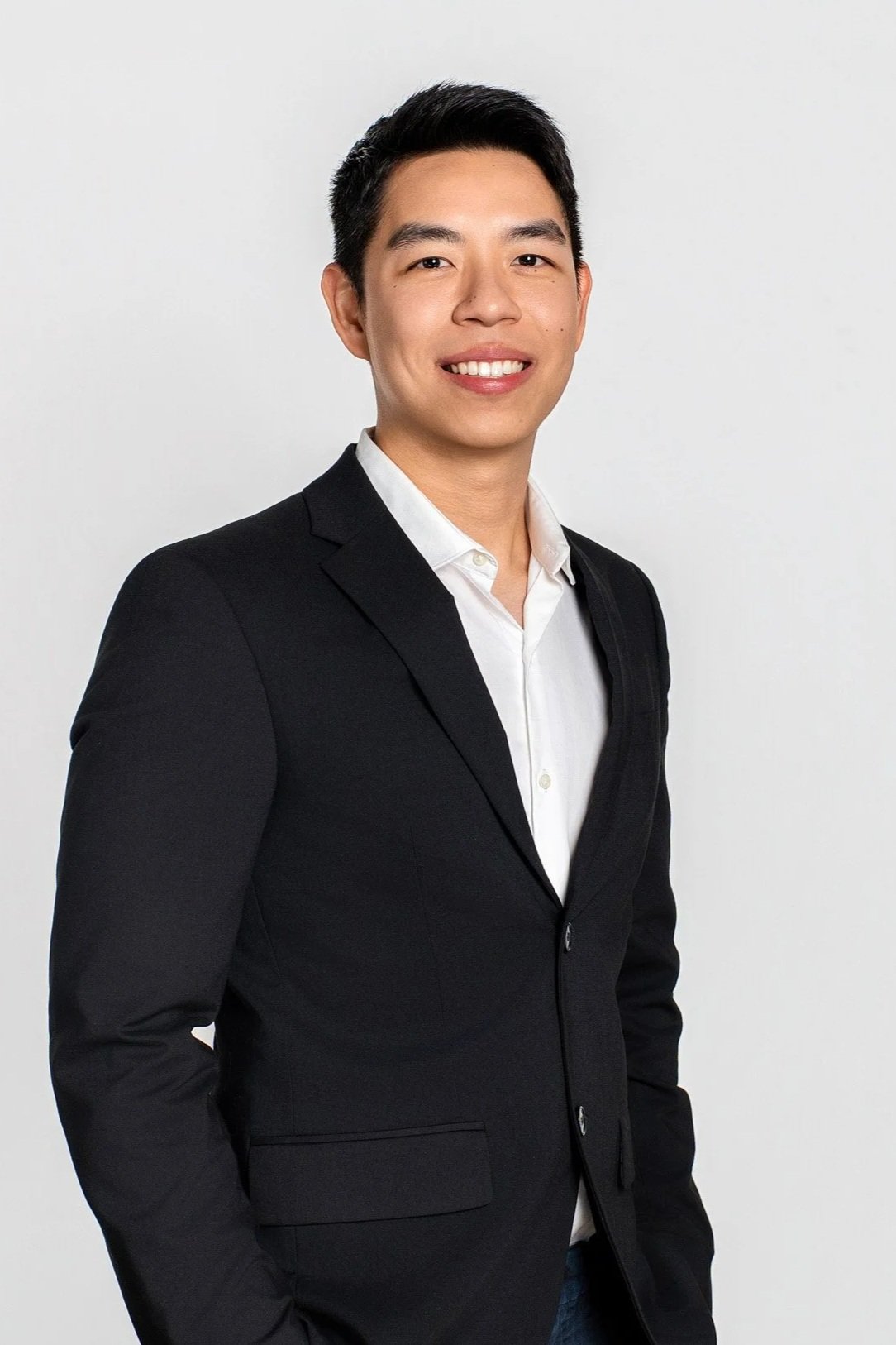 Formal corporate headshot for a lawyer, conveying trust and professionalism.