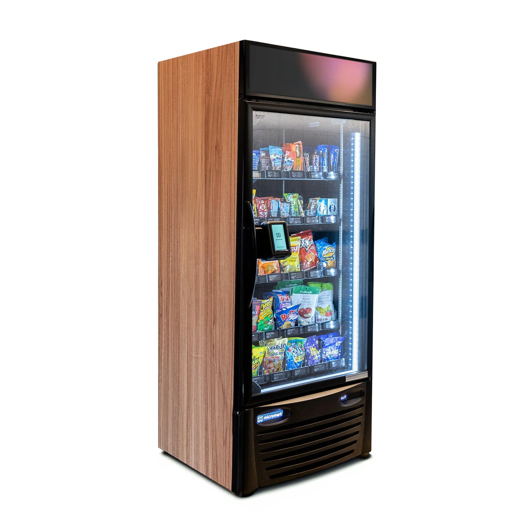 Vending machine with various snacks inside, wood panel exterior, digital payment screen, and LED lighting.