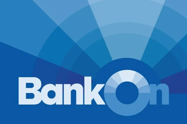 Logo for Bank On, featuring a blue circular design and the words 'Bank On' in bold white letters.