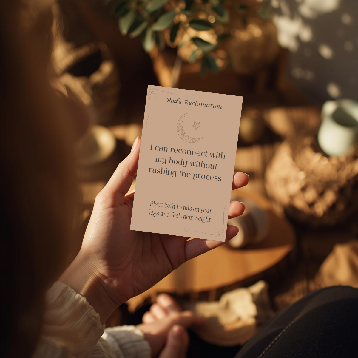 product mockup in hand for trauma affirmation deck .png