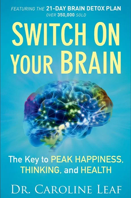 Book cover for 'Switch On Your Brain' by Dr. Caroline Leaf, featuring a colorful digital illustration of a brain with glowing neural connections against a blue background, highlighting the 21-day brain detox plan.