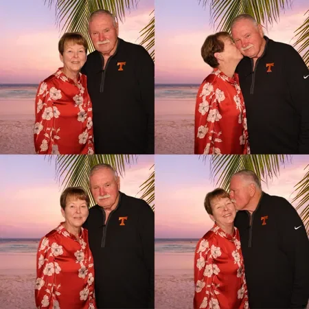 Four photos of an elderly woman and a man standing on a beach at sunset, with a palm tree in the background; in the top right photo, the woman kisses the man on the cheek, and in the bottom right, the man kisses the woman on the forehead.