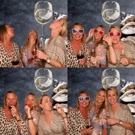 Open air photo booth for Sarasota Longboat Key restaurant fundraiser with custom background