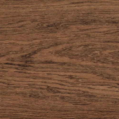 Superficie de madera con vetas marrones.