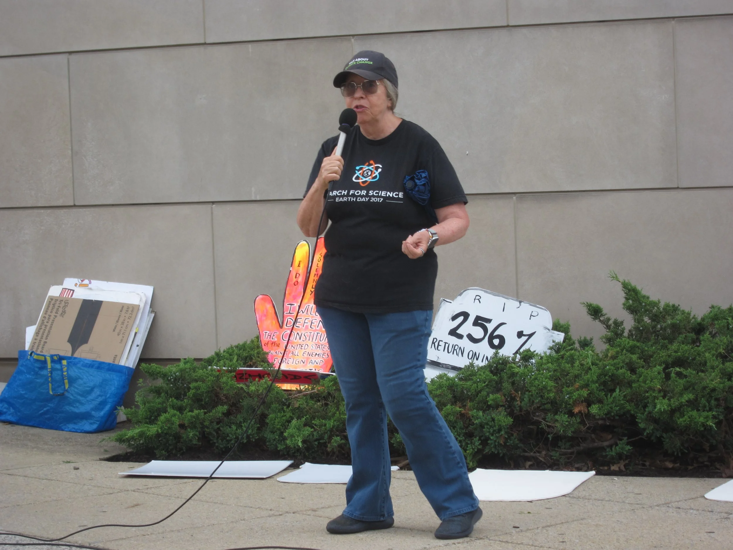 A person speaks into a microphone