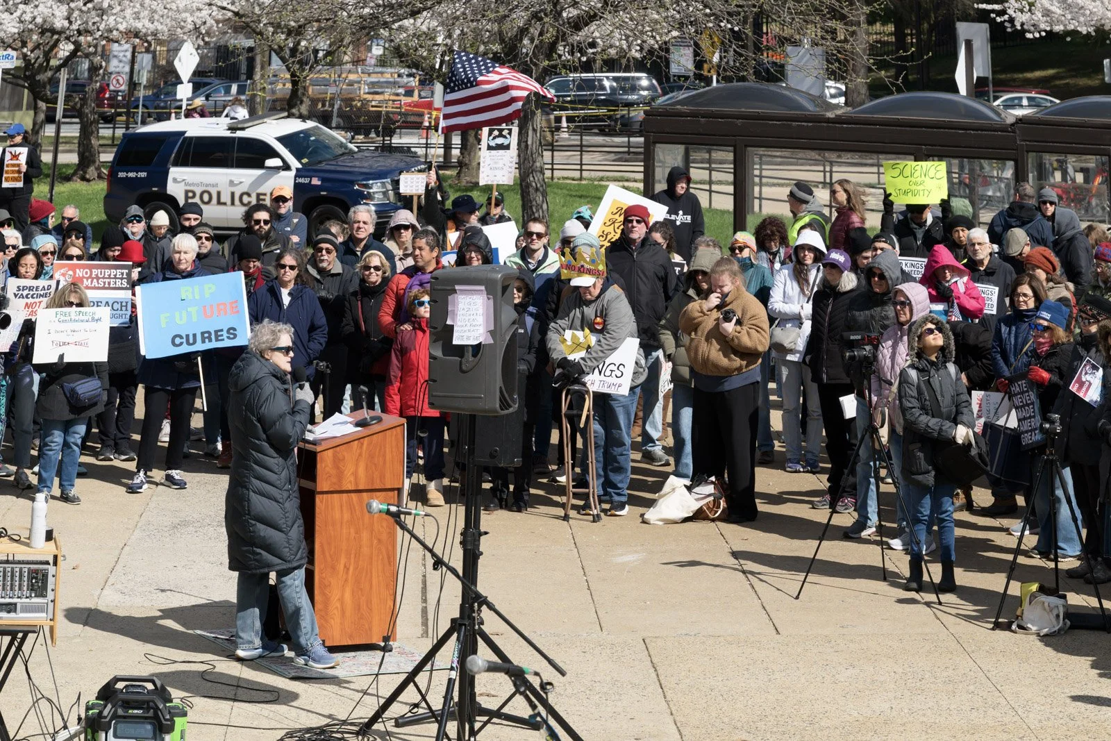Dr. Marrazzo speaking with a large view of the crowd surrounding her