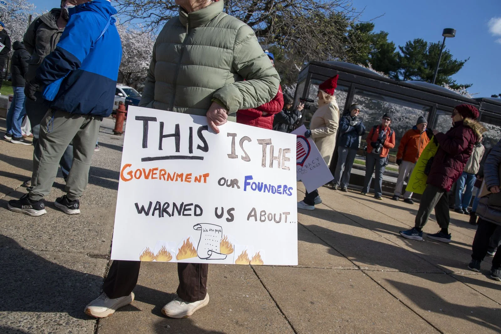 A protest sign saying "This is the government our founders warned us about"