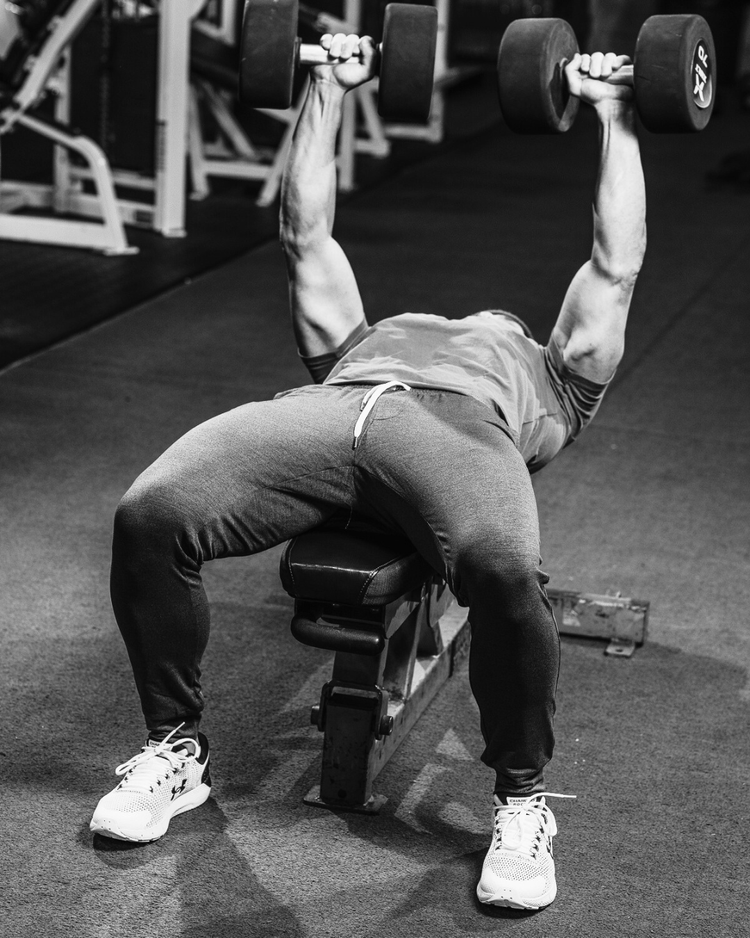Dr. Alfonso Alfini doing bench press