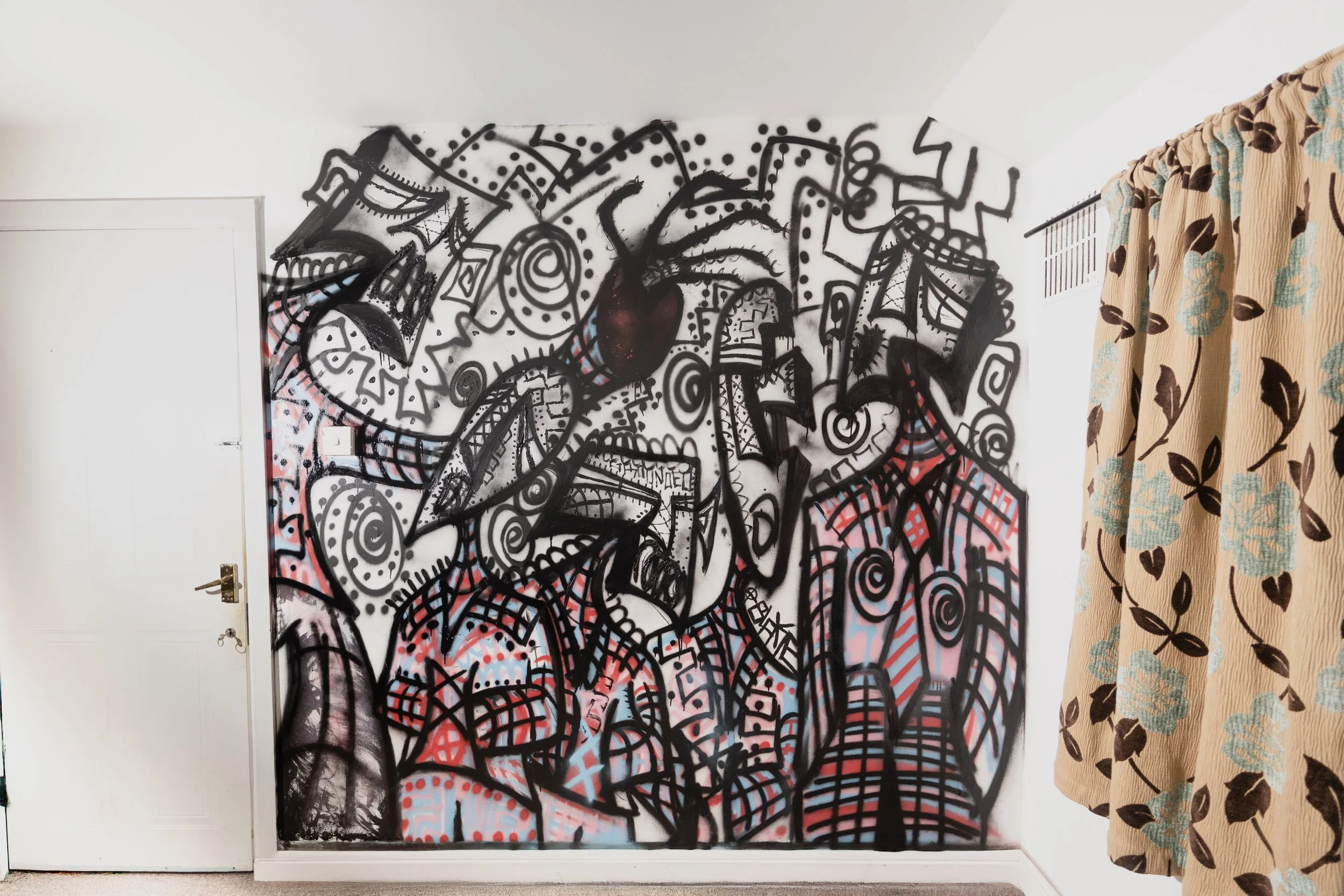 "UNTITLED" - MEDIUM: SPRAYPAINT, ACRYLIC PAINT ON WALL 