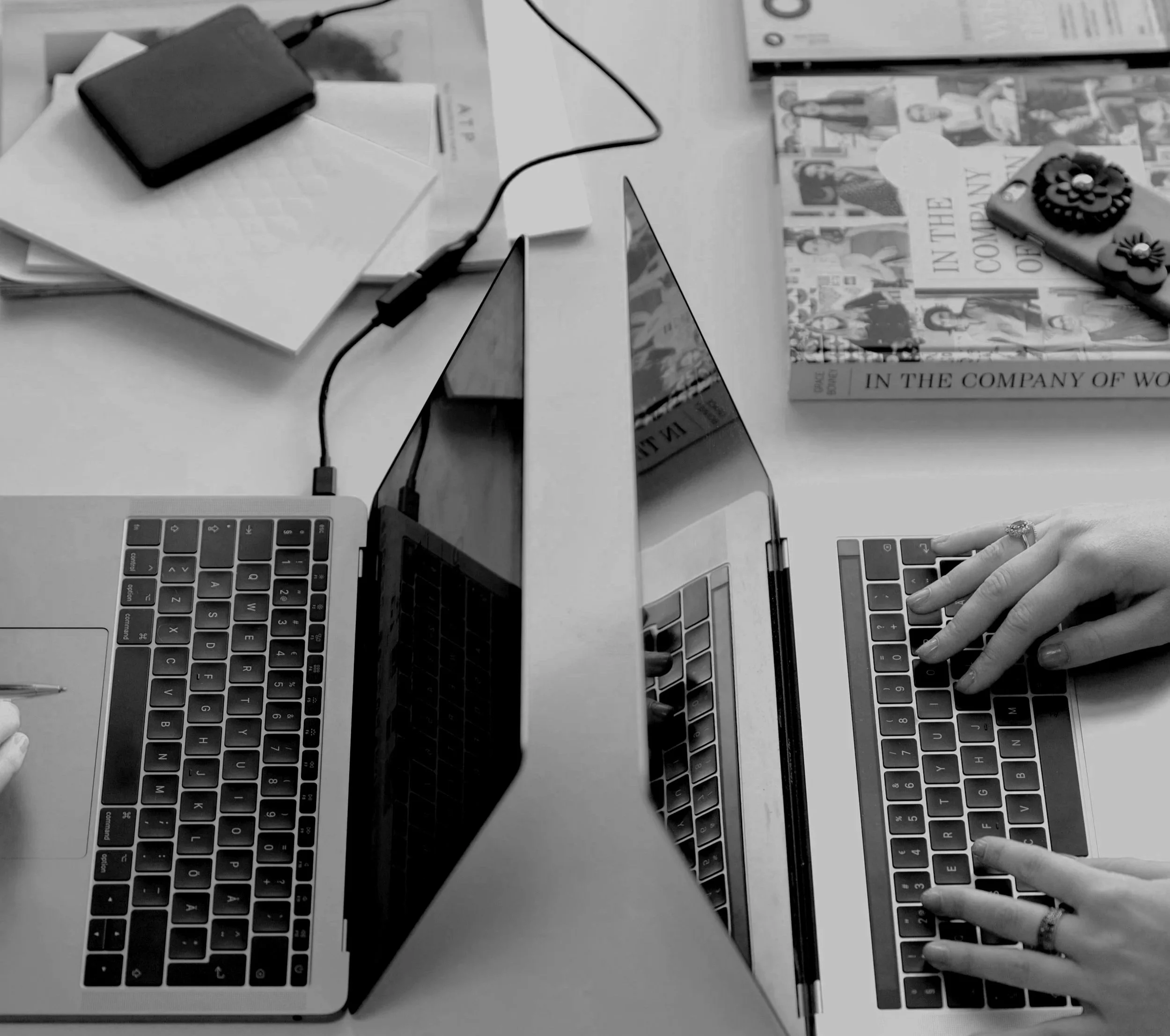 two laptops facing each other