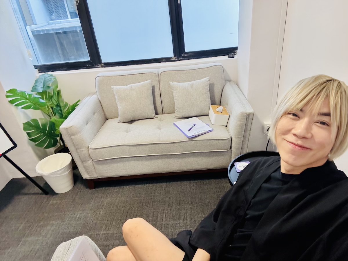 Allan Ng, counsellor and founder of Opening Doors with Allan, in a private therapy room in Singapore offering couples counselling.