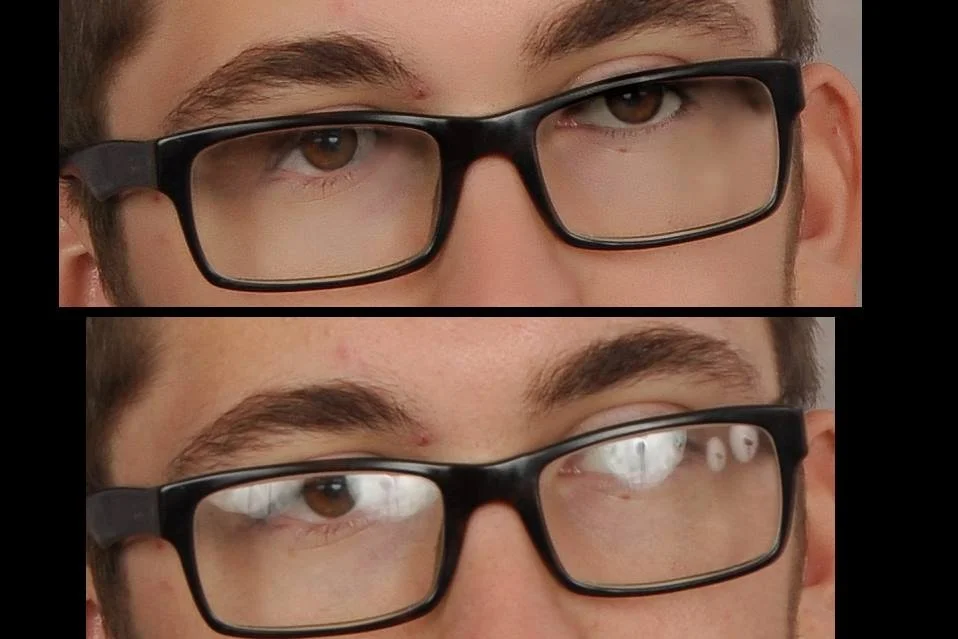 Heavy glasses glare that has been digitally restored to see the eyes.