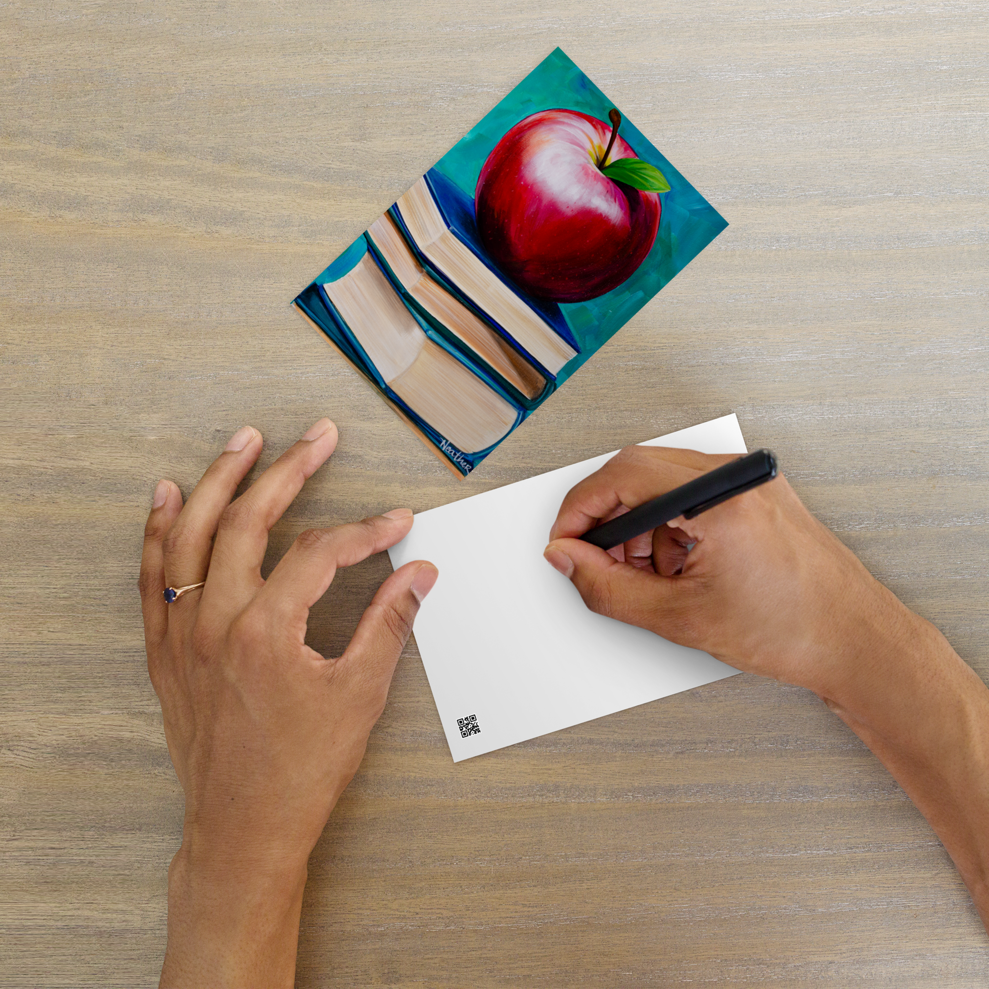 apple on books postcard ls.png