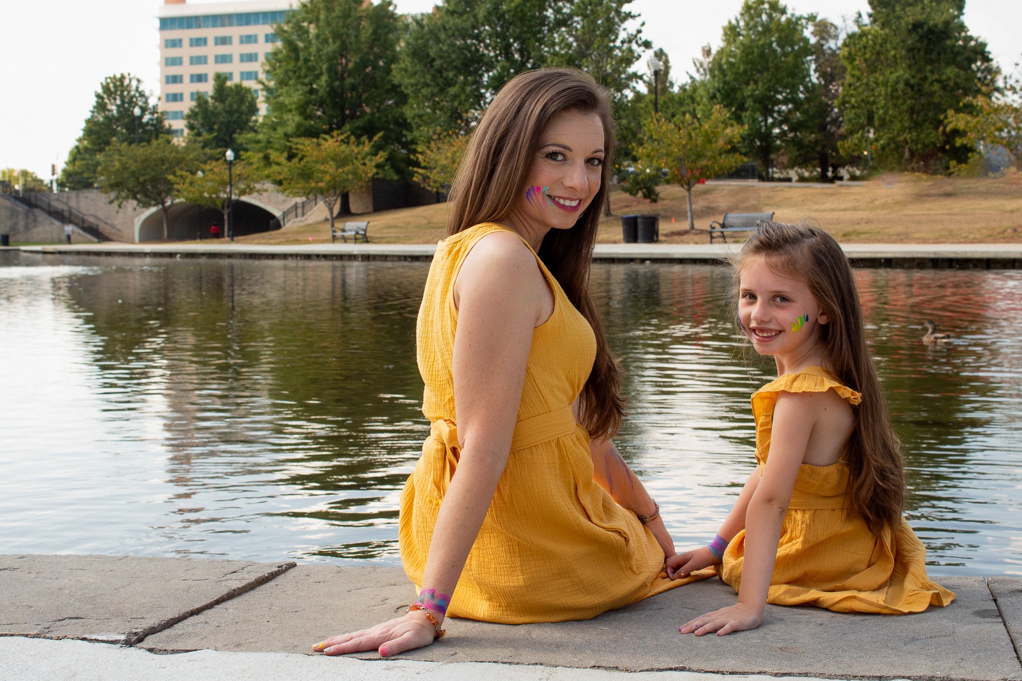 mother and daughter, paint session, outdoors