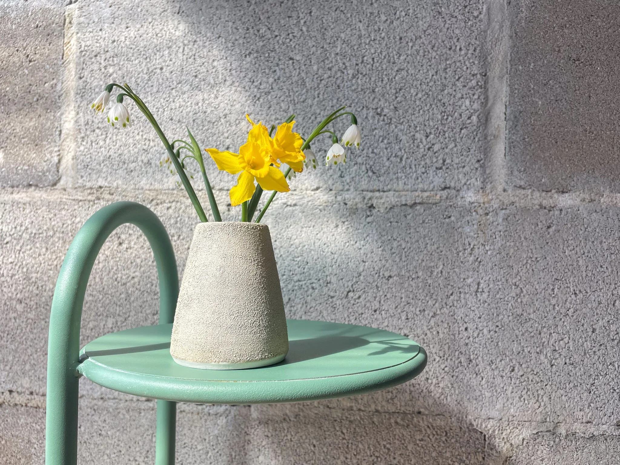 wheel-thrown stoneware vase in pale warm textured glaze, Scandinavian minimal form