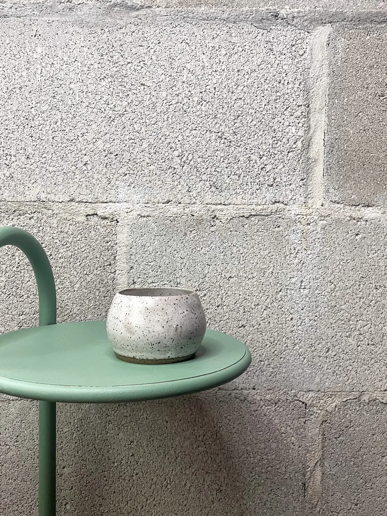 hand-glazed ceramic small cup in glossy white, Nordic punk aesthetic, Wrecked Works