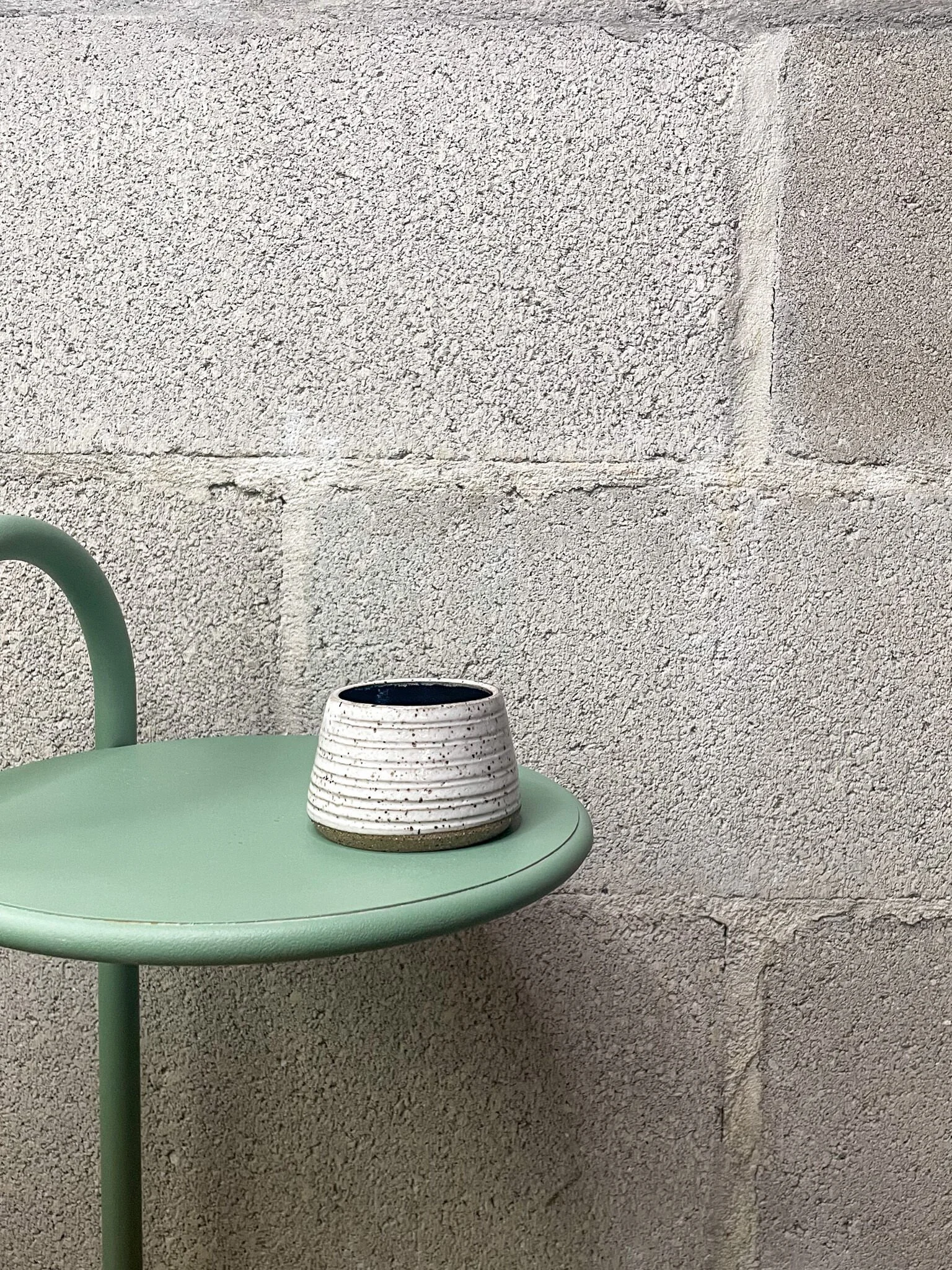 hand-glazed ceramic pottery cup in glossy white, brutalist minimal edge, cone, cortado