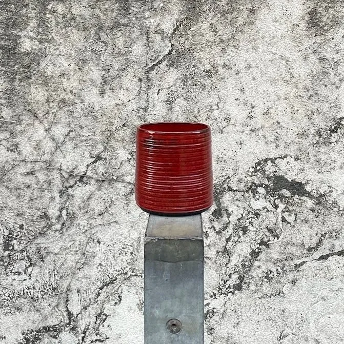 hand-glazed ceramic coffee mug in glossy red, punk minimal aesthetic, Auburn Alabama