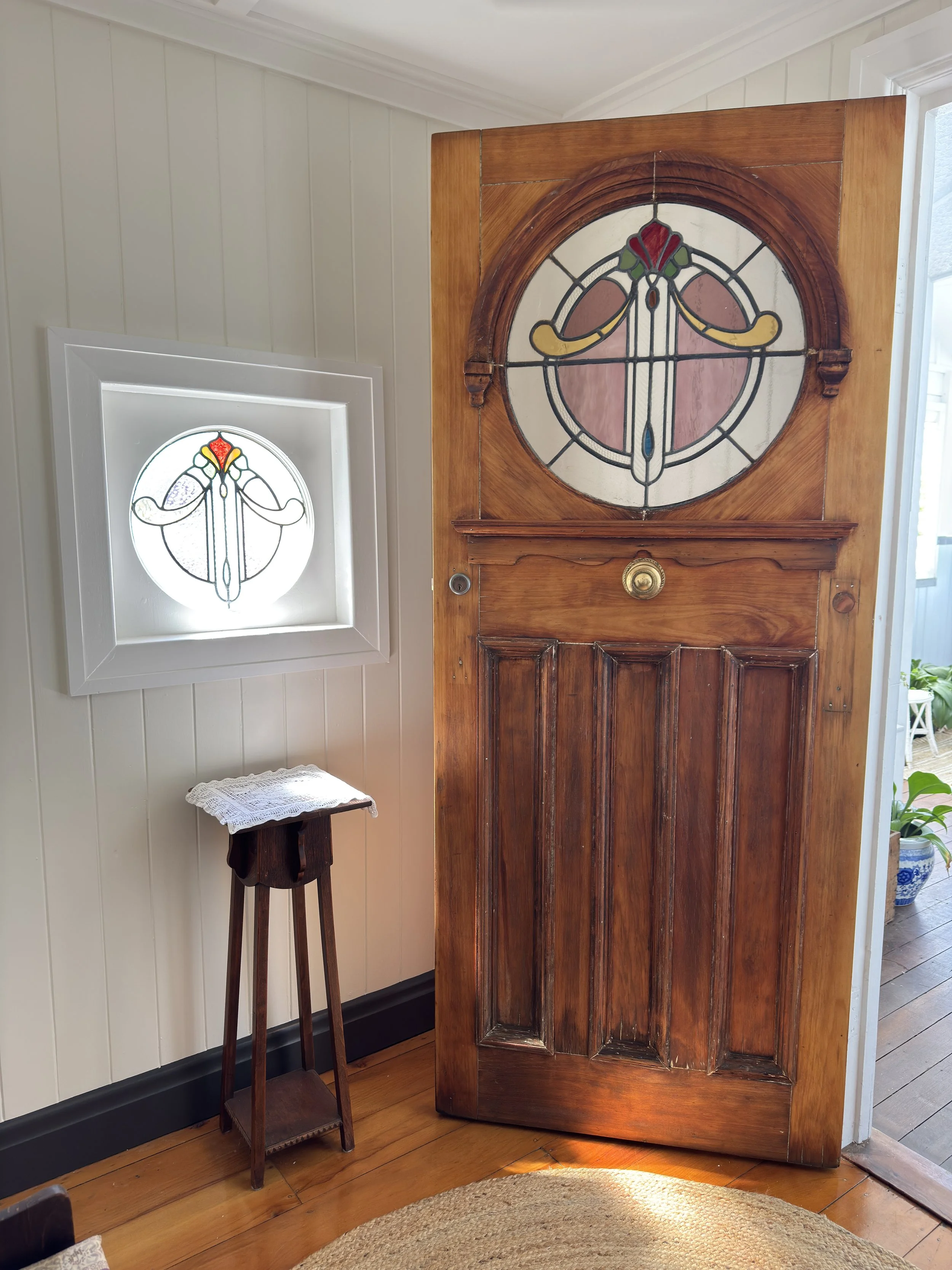 Repainted the entry using Dulux and Intergrain products. Stripped back the stained-glass front door and coated it in oil