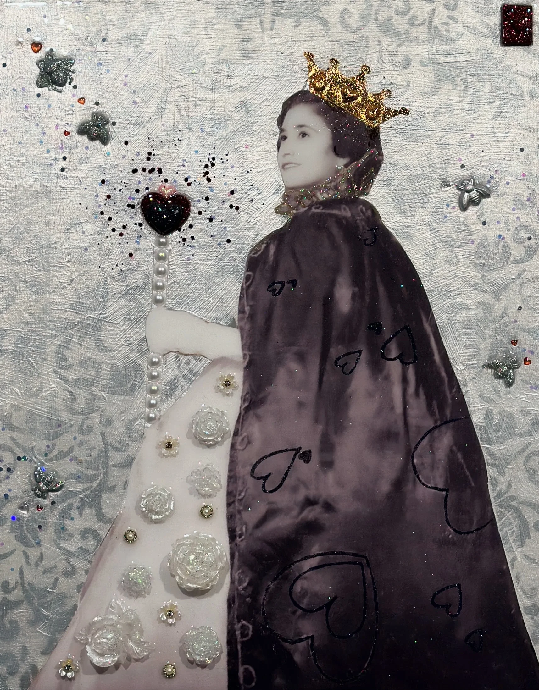 Queen of Valentine is a 40 × 30-inch custom mixed-media portrait by Dallas-based contemporary artist Hunter Connor. Deep reds, romantic symbolism and regal imagery transform the commissioned subject into a modern queen, presenting love, confidence an