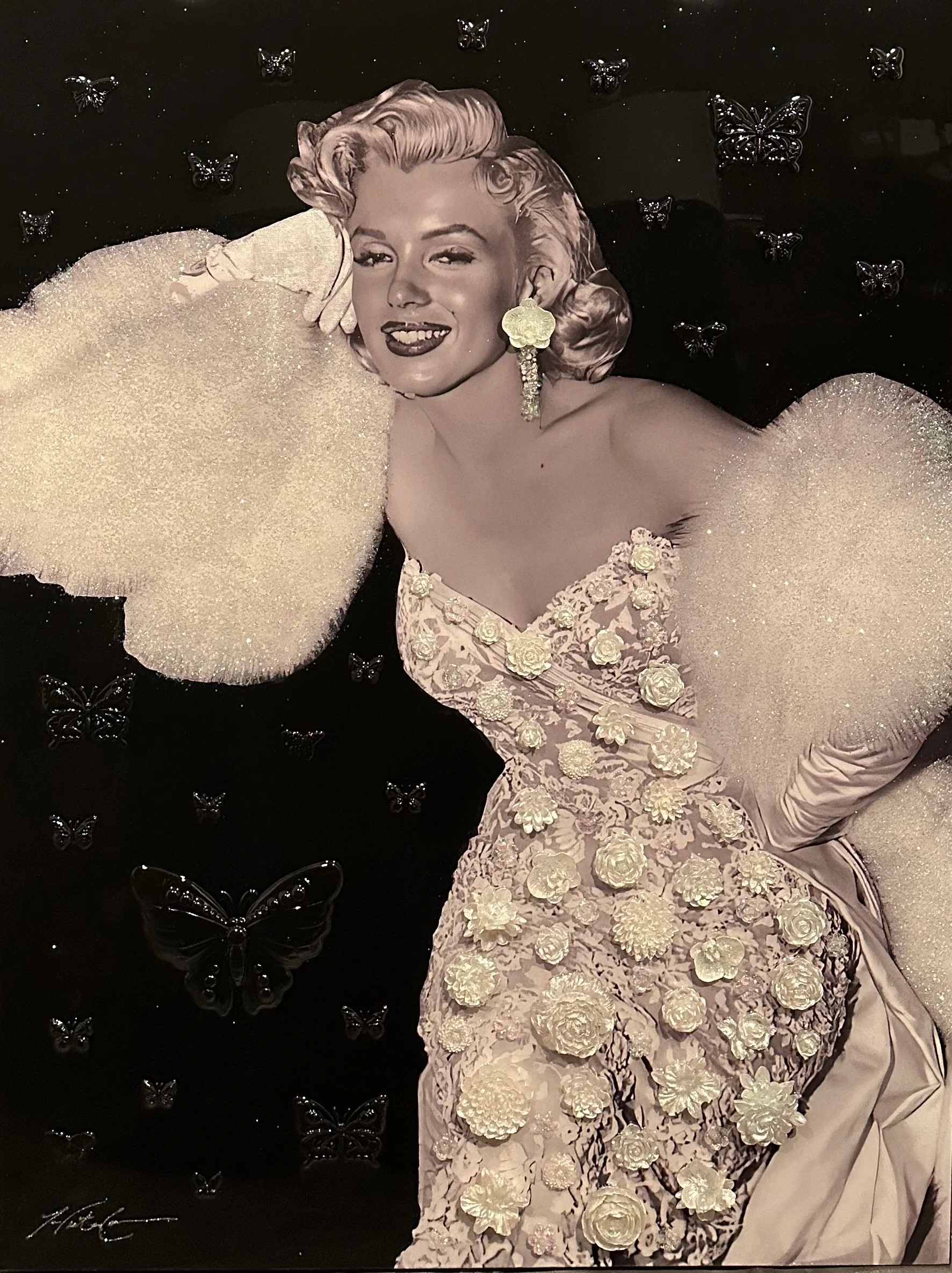 Marilyn Monarchy — 48 × 36 × 1.5 inches. Inspired by Marilyn Monroe, the Hollywood legend whose beauty and screen presence made her one of the most recognizable figures in popular culture, this original mixed-media and resin portrait combines vintage