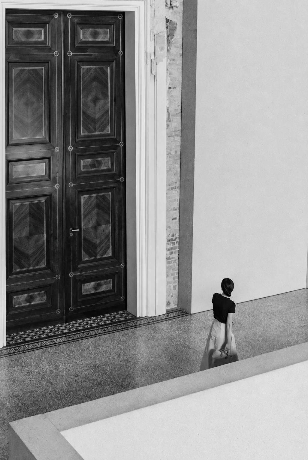 Woman walking through a modern interior