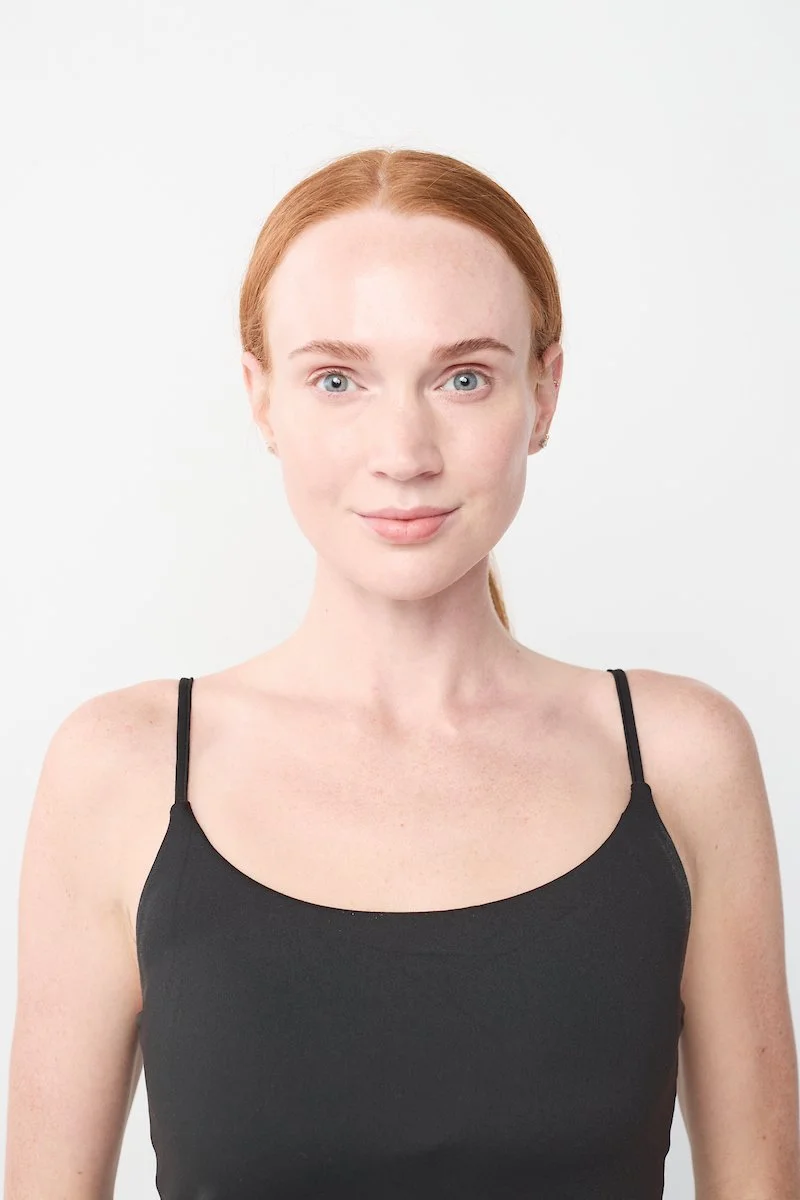 Taylor VanBebber smiling with her hair tied back.